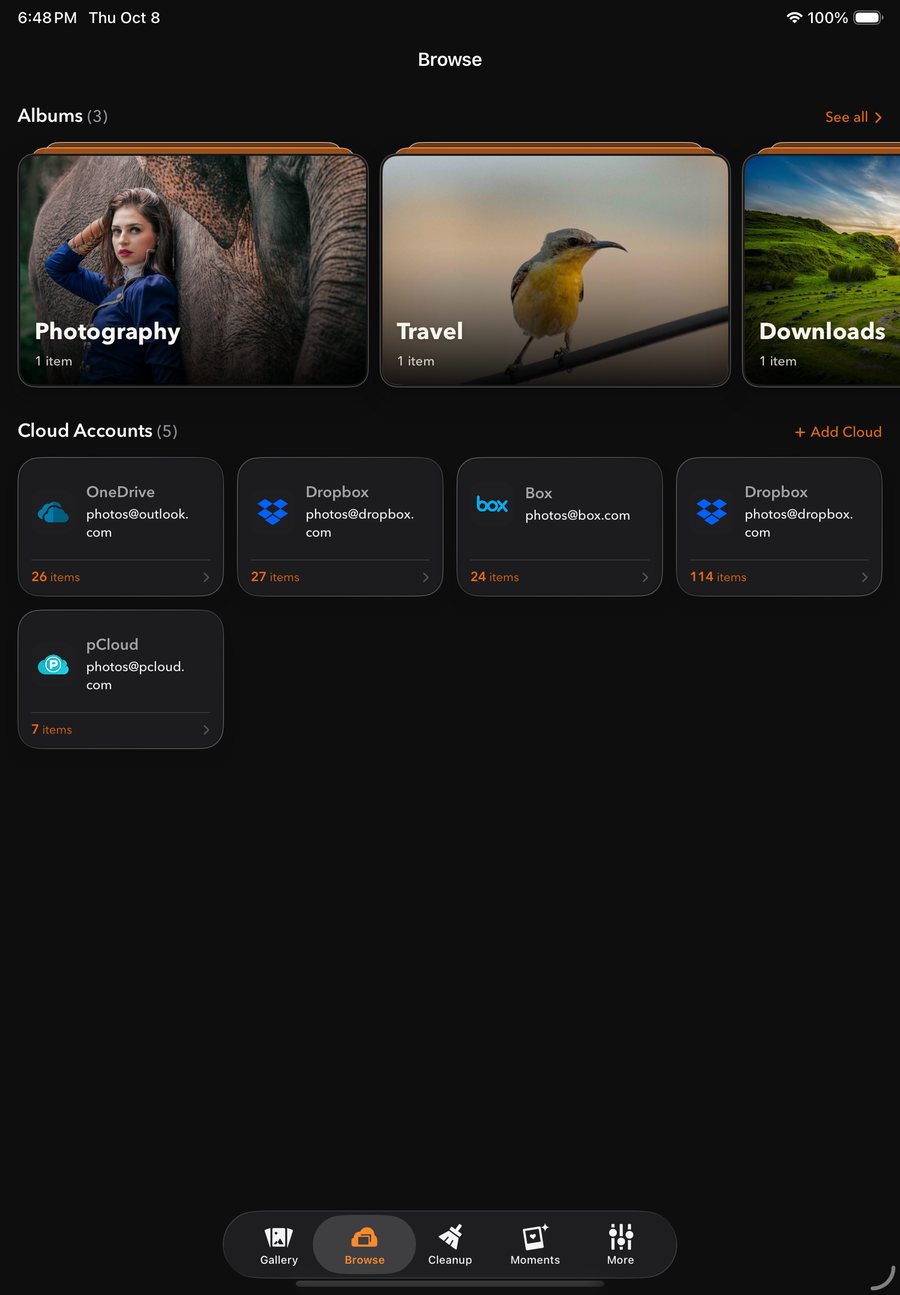 PhotoMesh Browse on iPad in dark mode, with albums and five cloud accounts